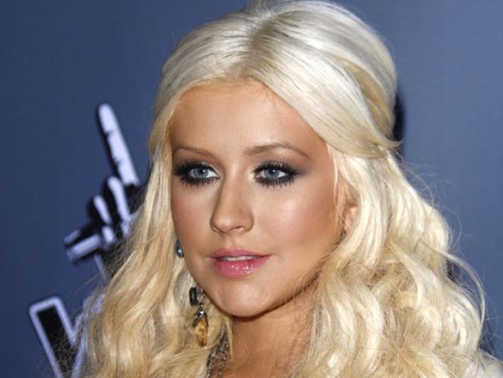 Christina Aguilera raises millions for charity